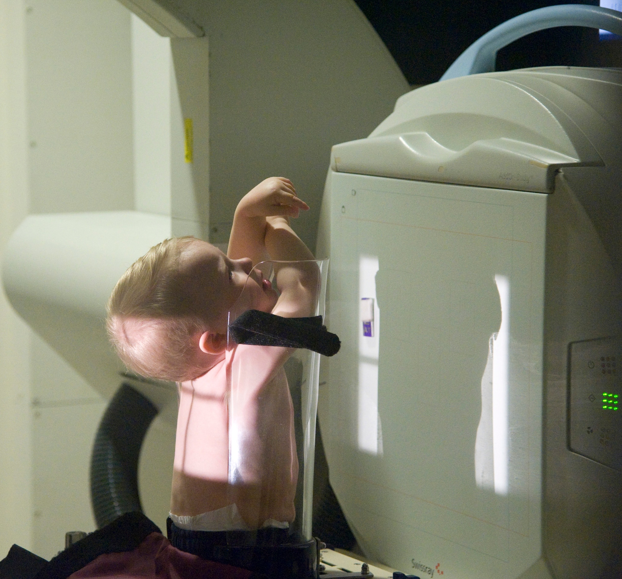 Jaxon Todd receives a chest X-ray March 22, 2012, at the Dover Air Force Base, Del., outpatient medical clinic. Chest X-rays are commonly used in children younger than 3 years old to identify signs of pneumonia. (U.S. Air Force photo by Senior Airman Matthew Hubby)
