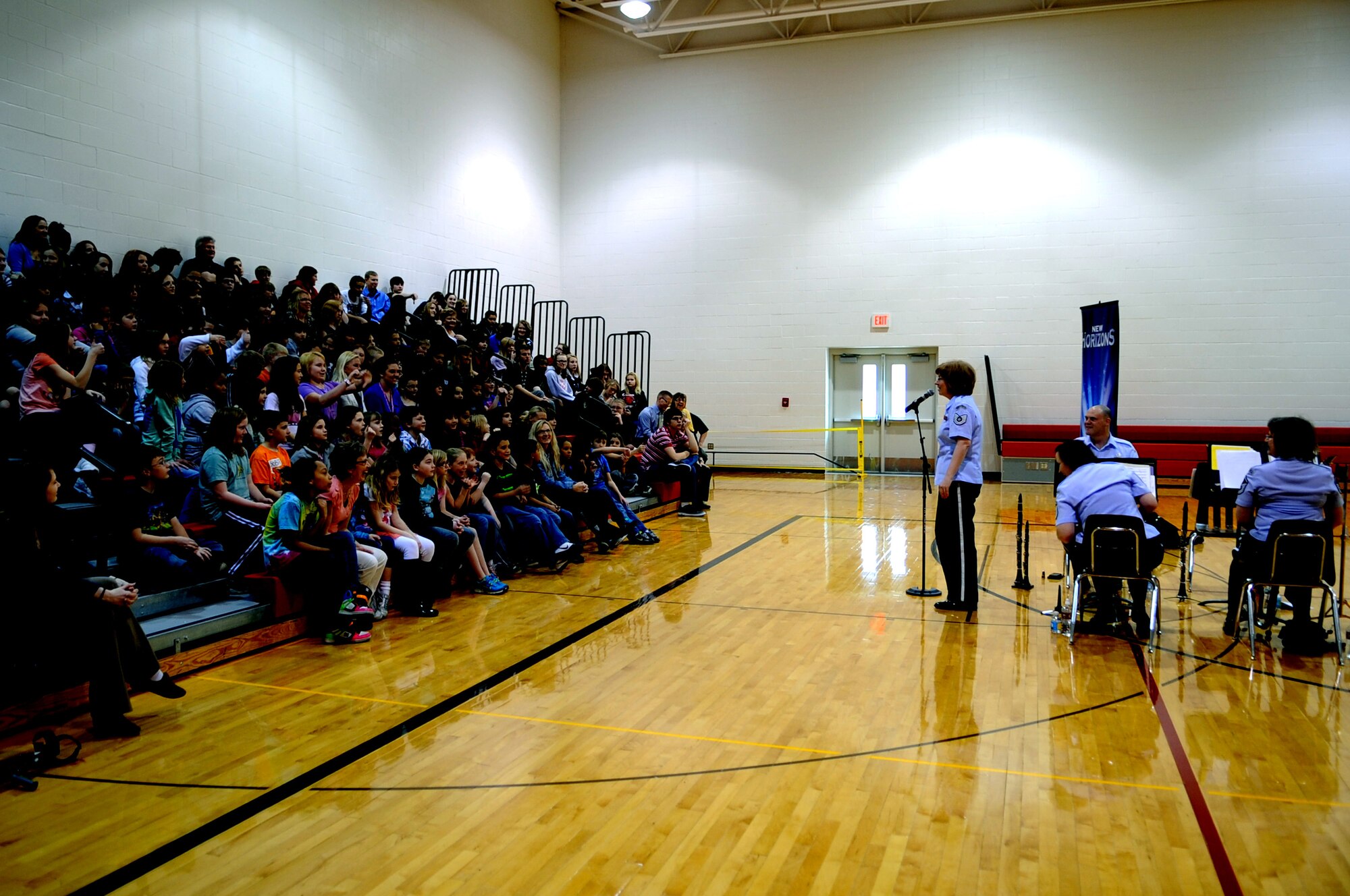 Tech. Sgt. Amy Lynch, clarinetist from the New Horizons, engages with students from Nathan Twining Middle School on Grand Forks Air Force Base, N.D., on March 15, 2012. Four members of New Horizons - part of the U.S. Air Force Heartland of America Band from Offutt AFB, Neb. - conducted 15 performances in five days for 1,107 children in on- and off-base schools earlier this month. (U.S. Air Force photo by Staff Sgt. Amanda N. Grabiec)