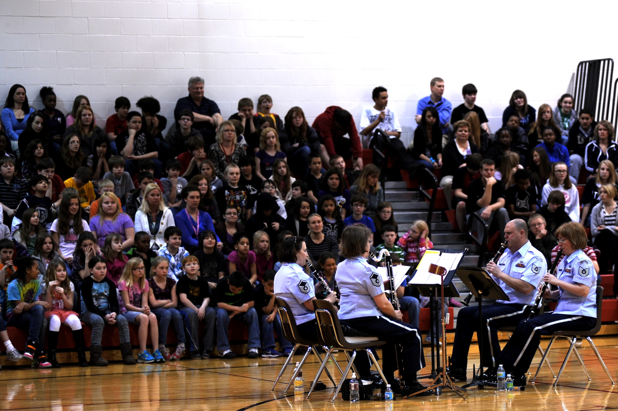 Members of New Horizons play a concert for the students of Nathan Twining Middle School on Grand Forks Air Force Base, N.D., on March 15, 2012. Four members of New Horizons - part of the U.S. Air Force Heartland of America Band from Offutt AFB, Neb. - conducted 15 performances in five days for 1,107 children in on- and off-base schools earlier this month.  (U.S. Air Force photo by Staff Sgt. Amanda N. Grabiec)