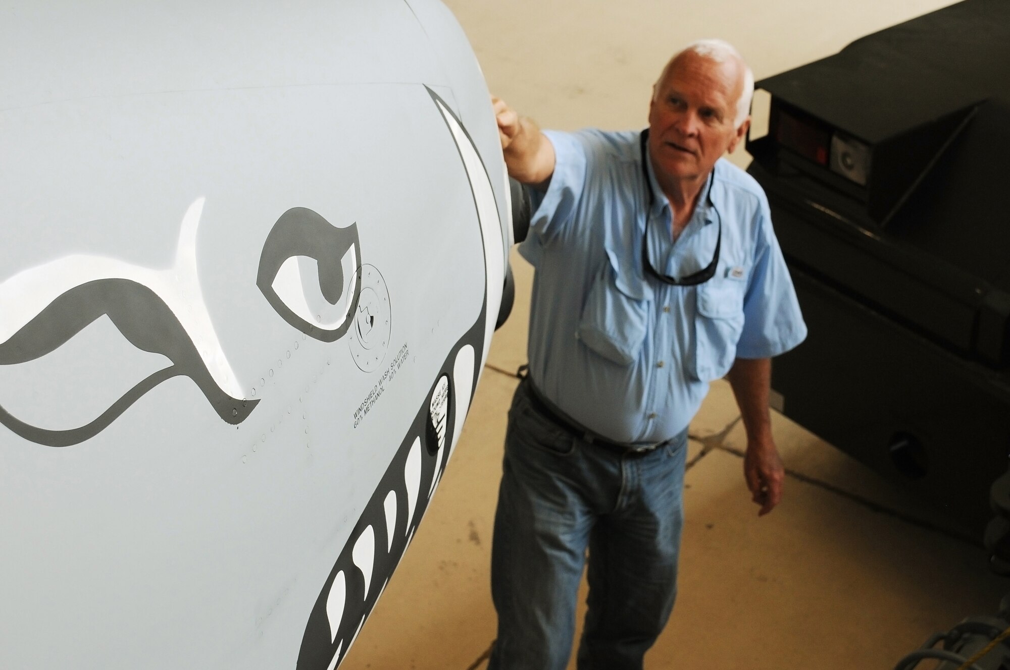 Barksdale Air Force base, La. -- Captain Ryan Turner, a pilot with the 11th Bomber Squadron, answers questions in the bomb bay of  B-52 Stratofortress while guiding a group of visitors at Barksdale Air Force Base, La., March 19, 2012.  The visiting civic leaders were part of an honorary commander's tour sponsored by the 927th Air Refueling Wing at Macdill AFB, Florida.  (U.S. Air Force photo by Staff Sgt. Jennie Chamberlin)
