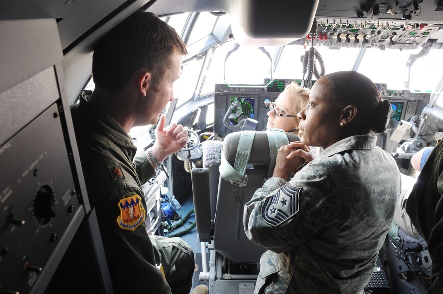 Dyess Air Force Base, Texas -- Major Justin Diehl, a pilot with the 317th Airlift Group, answers questions about the C-130 Hercules while giving a tour at Dyess Air Force Base, March 20, 2012.  More than 20 civic and military leaders visited Dyess AFB from MacDill AFB, Florida, as part of an honorary commander's tour.  (U.S. Air Force photo by Staff Sgt. Jennie Chamberlin)