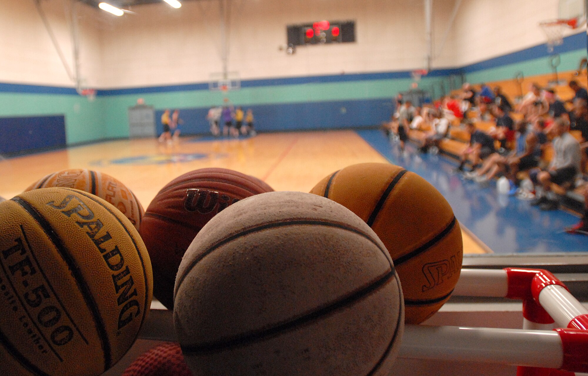 GOODFELLOW AIR FORCE BASE, Texas-- Team Goodfellow members, civilian and military, gather to watch the March Madness 3-on-3 Basketball Tournament, March 24, here. The single elimination tournament consisted of 15 participating teams competing to be the champions.  (U.S. Air Force photo/Airman 1st Class Michael Smith)