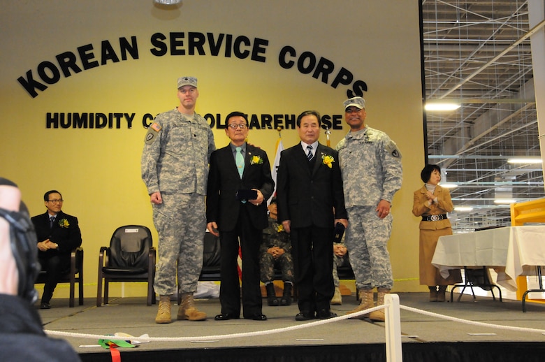 An Su-ok and Chin Bok-kyun served in the Korean Service Corps during the Korean War.  They both were the guests of honor during the ribbon cutting ceremony for the new humidity controlled warehouse at Camp Carroll Feb. 10.
