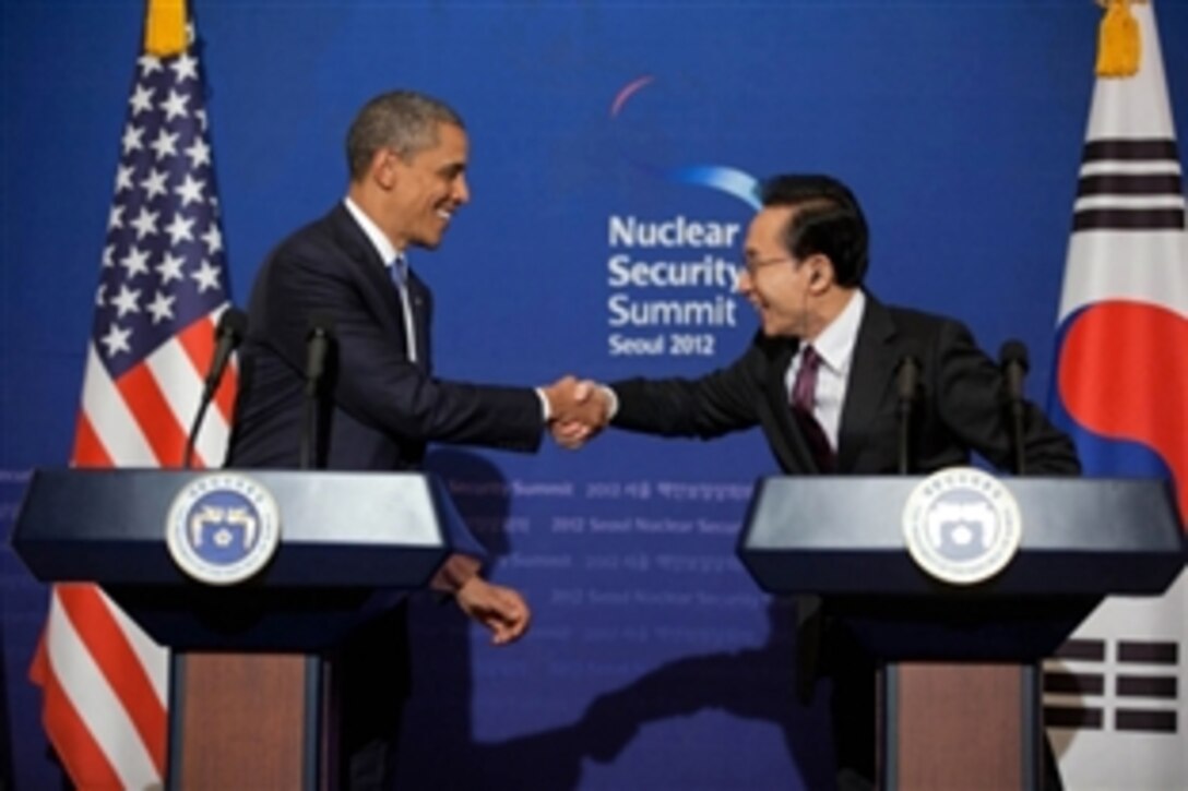 U.S. President Barack Obama and South Korean President Lee Myung-bak participate in a press conference at the Blue House in Seoul, South Korea, March 25, 2012. 