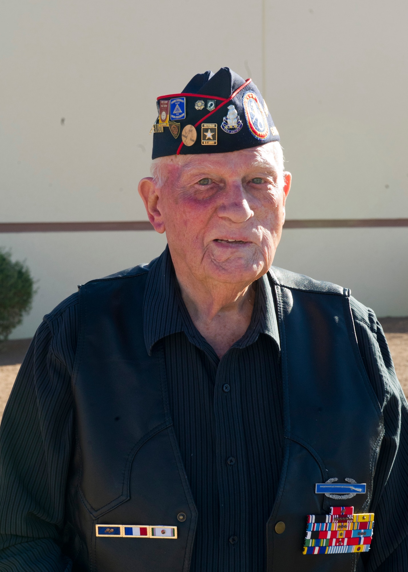William Eldridge, a retired U.S. Army master sergeant, poses for a photo at White Sands Missile Range, N.M., March 24. Eldridge was taken prisoner by Japanese soldiers for three and a half years, and endured many hardships, including the Bataan Death March. After he was freed, Eldridge went on to serve 18 more years in the Army, and to this date, is the last surviving member of his unit, Company M, 31st Regiment. (U.S. Air Force photo by Airman 1st Class Siuta B. Ika/Released)