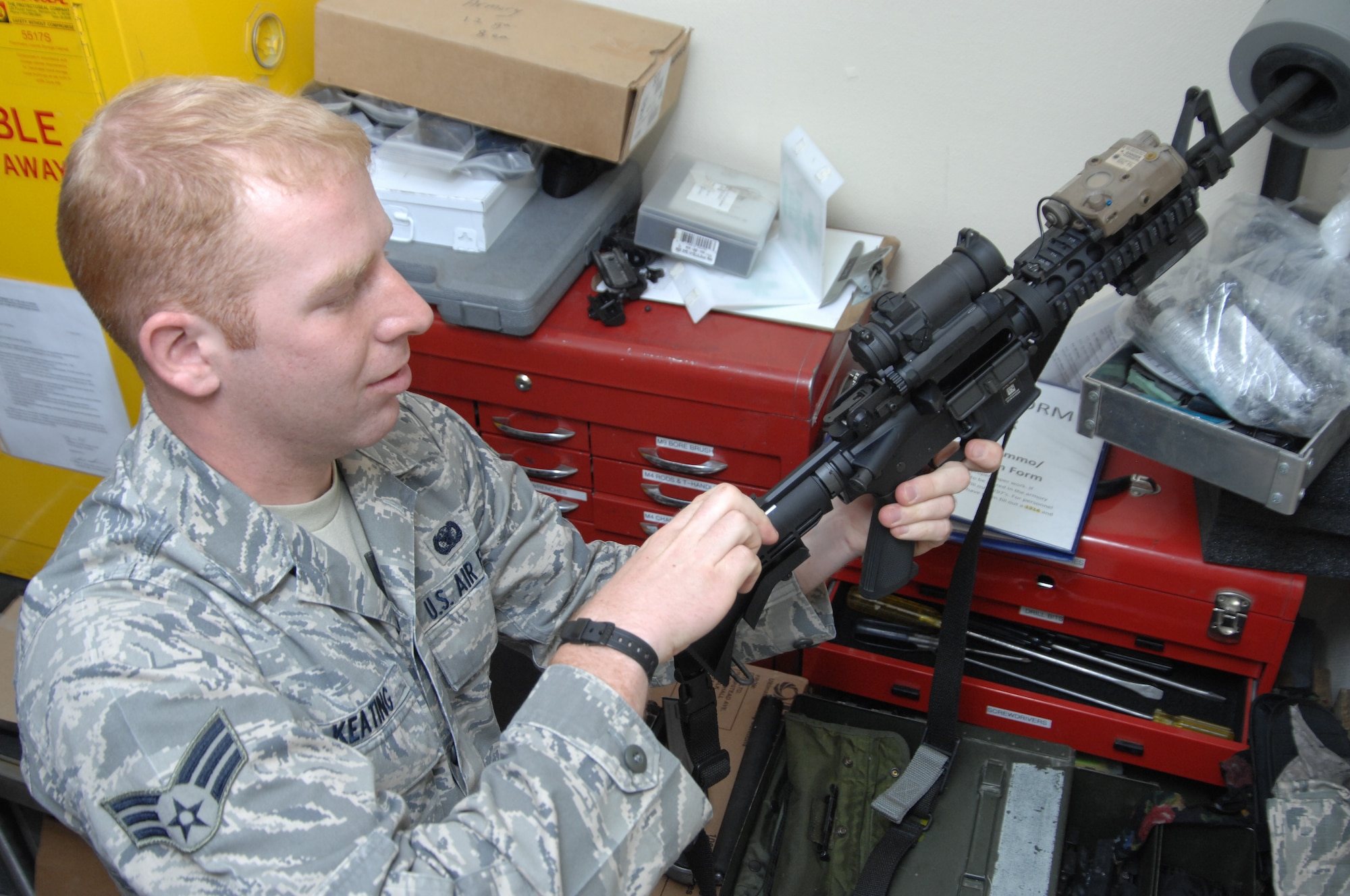 U.S. Air Force Senior Airman Andrew Keating, 366th Security Forces Squadron armorer, clears an M-4 carbine inside the armory March 27, 2012, at Mountain Home Air Force Base, Idaho. When a weapon is damaged or not working properly, armory personnel get to find and fix the problem. (U.S. Air Force photo/ Senior Airman Benjamin Sutton)