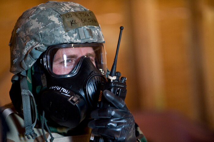 U.S. Air Force Tech. Sgt. Shawn Konen, 99th Civil Engineer Squadron structures craftsman, communicates on a radio during an Operational Readiness Exercise, March 21, 2012, at Nellis Air Force Base, Nev. The Ability to Survive and Operate training portion challenged Airmen to react to a variety of scenarios they could face in a combat zone. (U.S. Air Force photo by Airman 1st Class Matthew Lancaster)