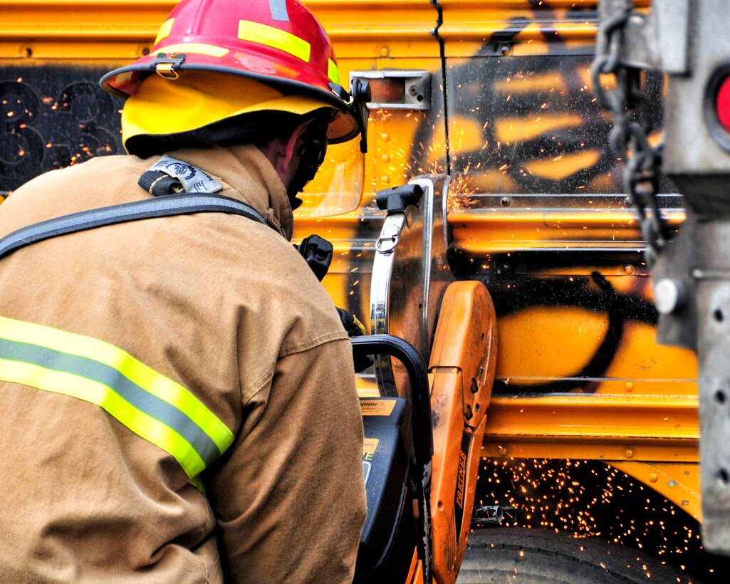 Members of the Niagara Falls Air Reserve Station Fire Department engage in a joint exercise with Lewiston #2 Fire Department, Lewiston Fire Company No. 1, Upper Mountain Fire Company and the Niagara County Sheriff’s Department March 24, 2012 Lewiston NY. The department’s trained in multiple scenarios including a Bus vs. snow plow extrication exercise. (U.S. Air Force photo by Tech Sgt. Joseph McKee)
