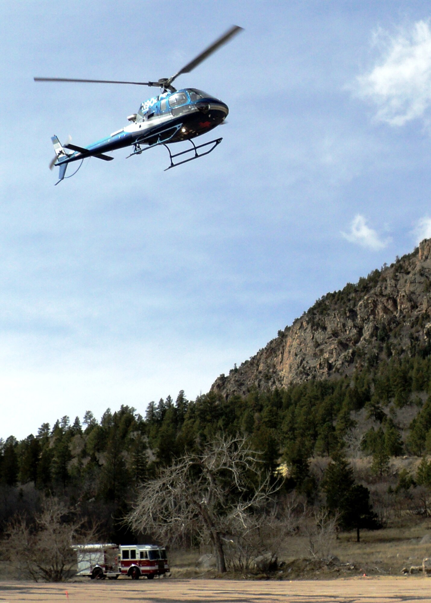 CHEYENNE MOUNTAIN AIR FORCE STATION, Colo. - The Cheyenne Mountain Air Force Station Fire Department hosted a joint training event with security forces and Flight for Life March 19. The event focused on landing requirements, patient loading and common operations. "Time is critical during emergencies,” said David Arcilla, assistant chief of operations. “Cooperative training ensures that security forces and the fire department are able to support each other in times of need." (U.S. Air Force photo/Chris Soliz)