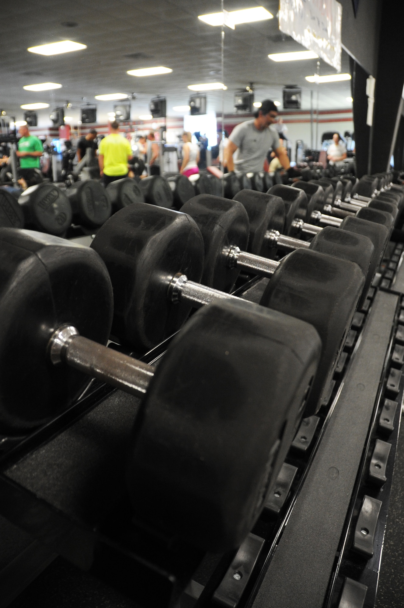 Keesler Muscle Mania competition was held March 24, 2012, at the Triangle Fitness Center, Keesler Air Force Base, Miss.  Fourteen individuals demonstrated their strength in squats, bench press and dead lift.  (U.S. Air Force photo by Kemberly Groue)