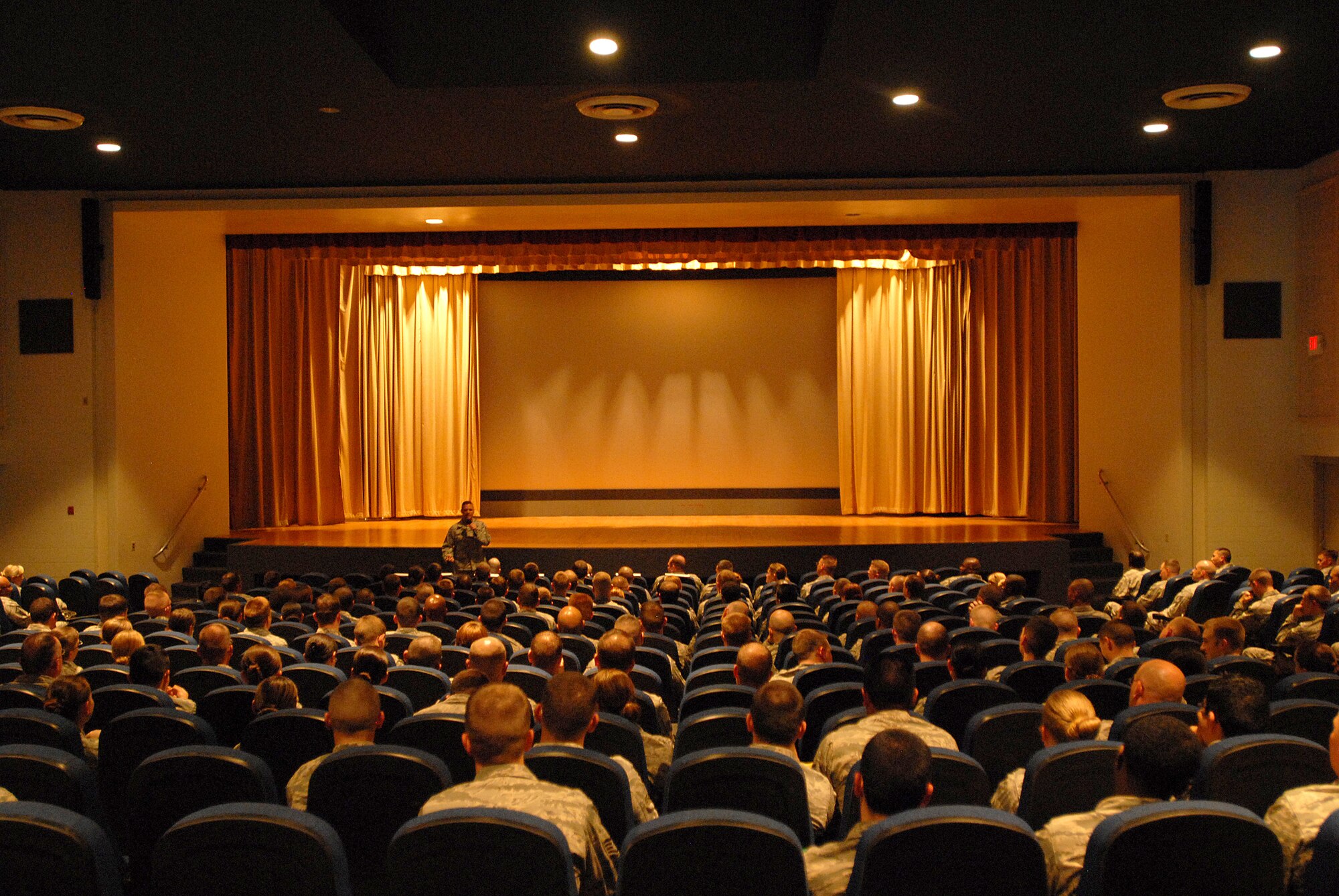 GOODFELLOW AIR FORCE BASE, Texas -- Chief Master Sgt. Oscar Mackin, 2nd Air Force Command Chief, speaks to enlisted members of Team Goodfellow, March 22. Chief Mackin held an enlisted all-call inside the base theater to introduce himself and to give Airman the chance to ask questions. (U.S. Air Force photo/ Airman 1st Class Michael Smith)