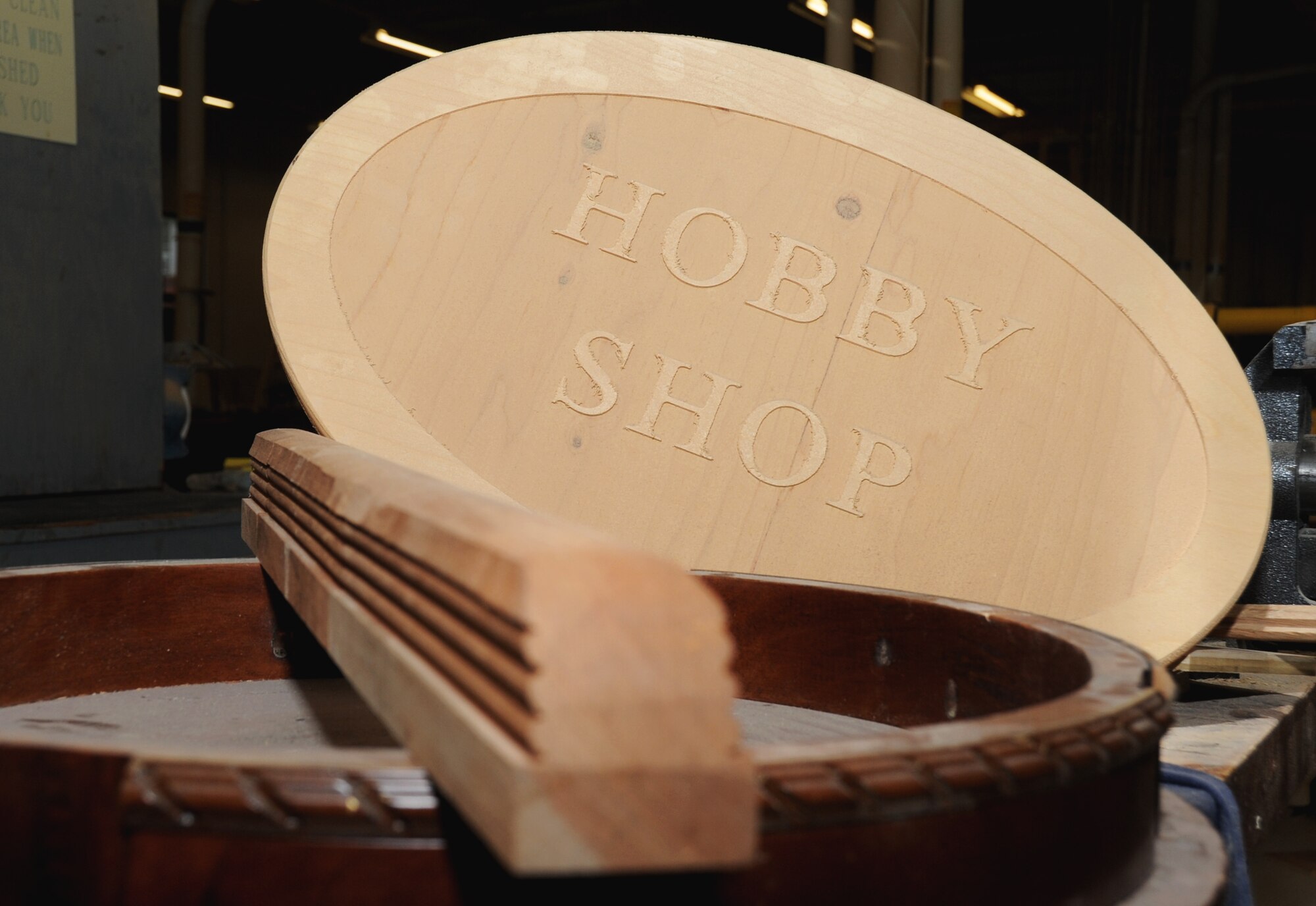 A Hobby Shop plaque stands among other pieces of decorative wood in the wood hobby shop March 23, 2012, at Keesler Air Force Base, Miss.  Unfortunately the current number of customers is not enough to support operating the hobby shop, but every effort will be made to make the facility available in a limited capacity, said Maj. John Ponton, 81st Force Support Squadron commander.  (U.S. Air Force photo by Kemberly Groue)
