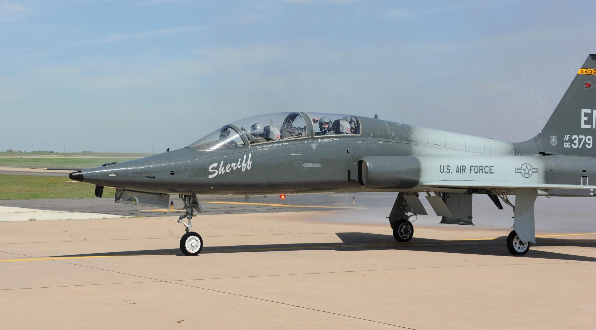 Brig. Gen. Darryl Burke, 82nd Training Wing commander, along with Maj. Brian Collins of the 80th Operational Support Squadron, taxi's back to the ENJPPT parking area after his T-38 "fini-flight" on Mar. 26, 2012 at Sheppard Air Force Base, Texas.  Fini-flights are a long-standing military aviator tradition honoring a pilot or commander on their departure from an assignment. (U.S. Air Force photo/Danny Webb)