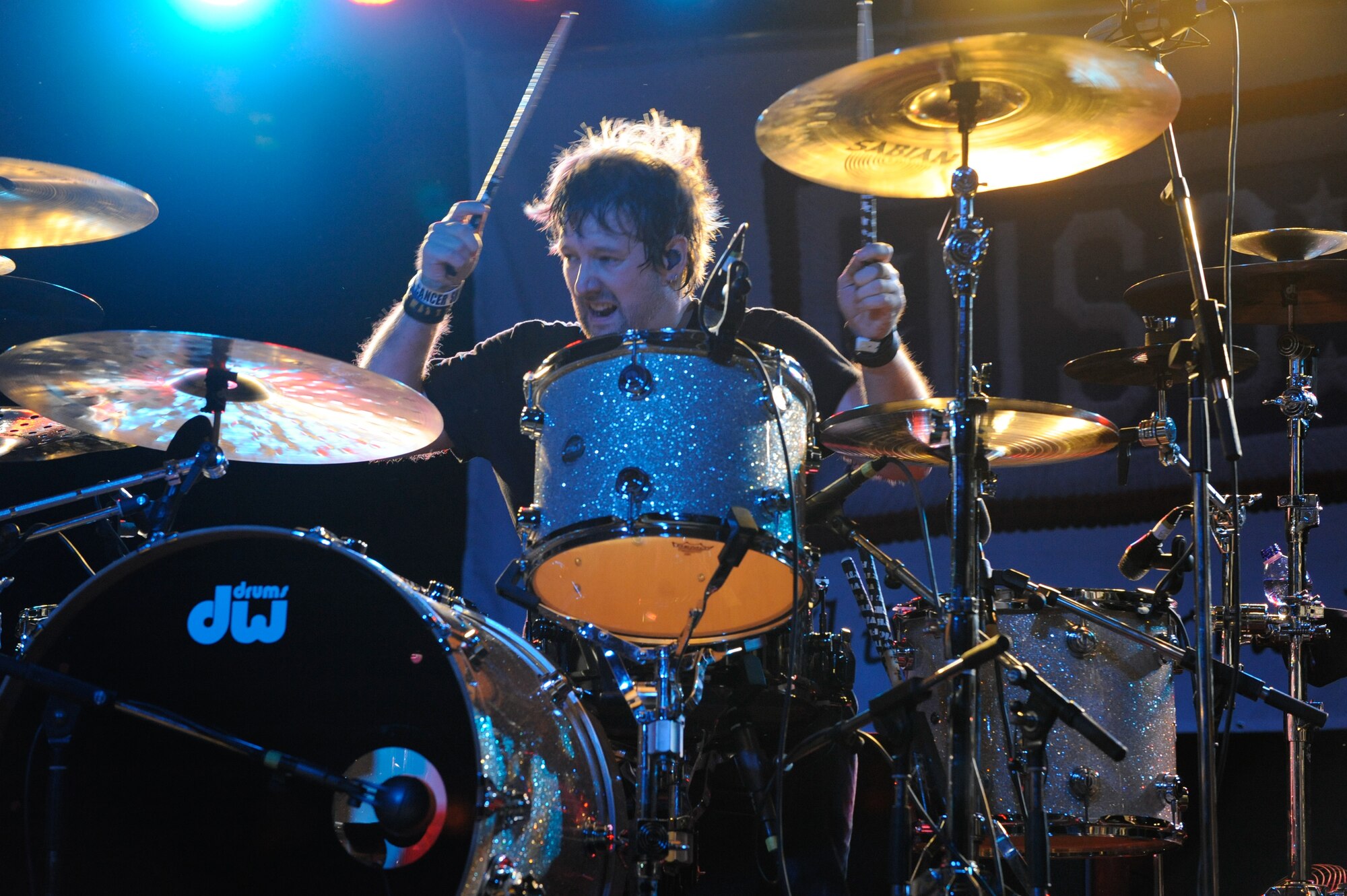 John Humphrey, drummer for the band Seether, performs for more than 870 Aviano Team members March 23, 2012, at Aviano Air Base, Italy. The hard-rock band visited Aviano as part of a USO tour through Italy and Turkey (U.S. Air Force photo/Staff Sgt. Justin Weaver)