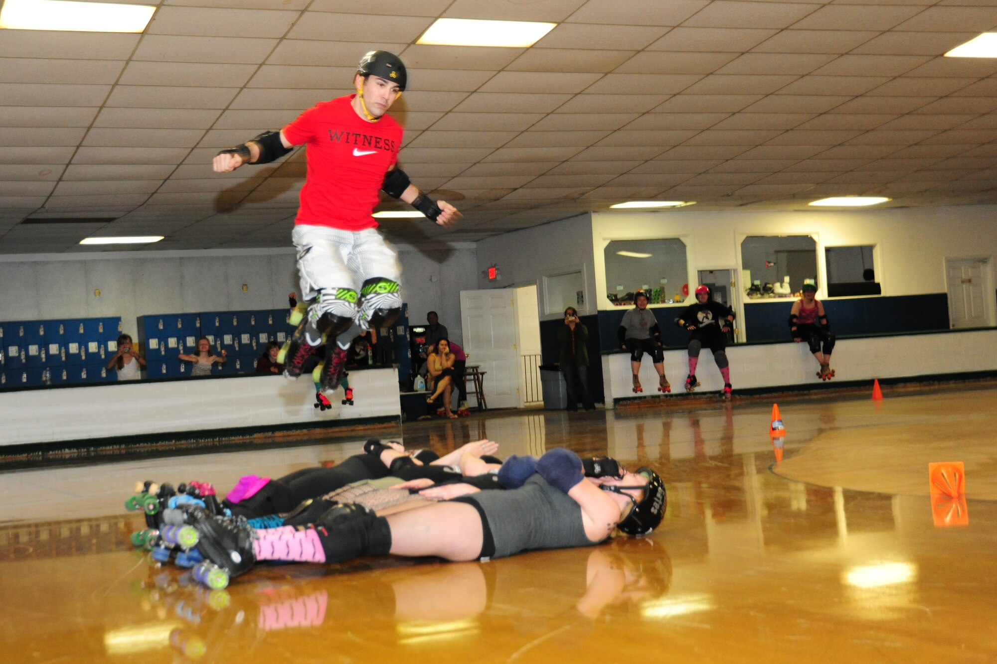 Team Andrews member Airman 1st Class Kevin Pertuit, 779th Medical Squadron Medical Logistics technician, demonstrates his skating skills during tryouts for the Freedom Belles roller derby league at the Waldorf Roller Rink on March 14.The Freedom Belles are a Class 3 Modern Athletic Derby Endeavors (MADE) flat-track rookie league. For more information on how to join the league or volunteer, visit the Freedom Belles roller derby open tryouts Facebook site. (U.S. Air Force photo/Senior Airman Amber Russell)