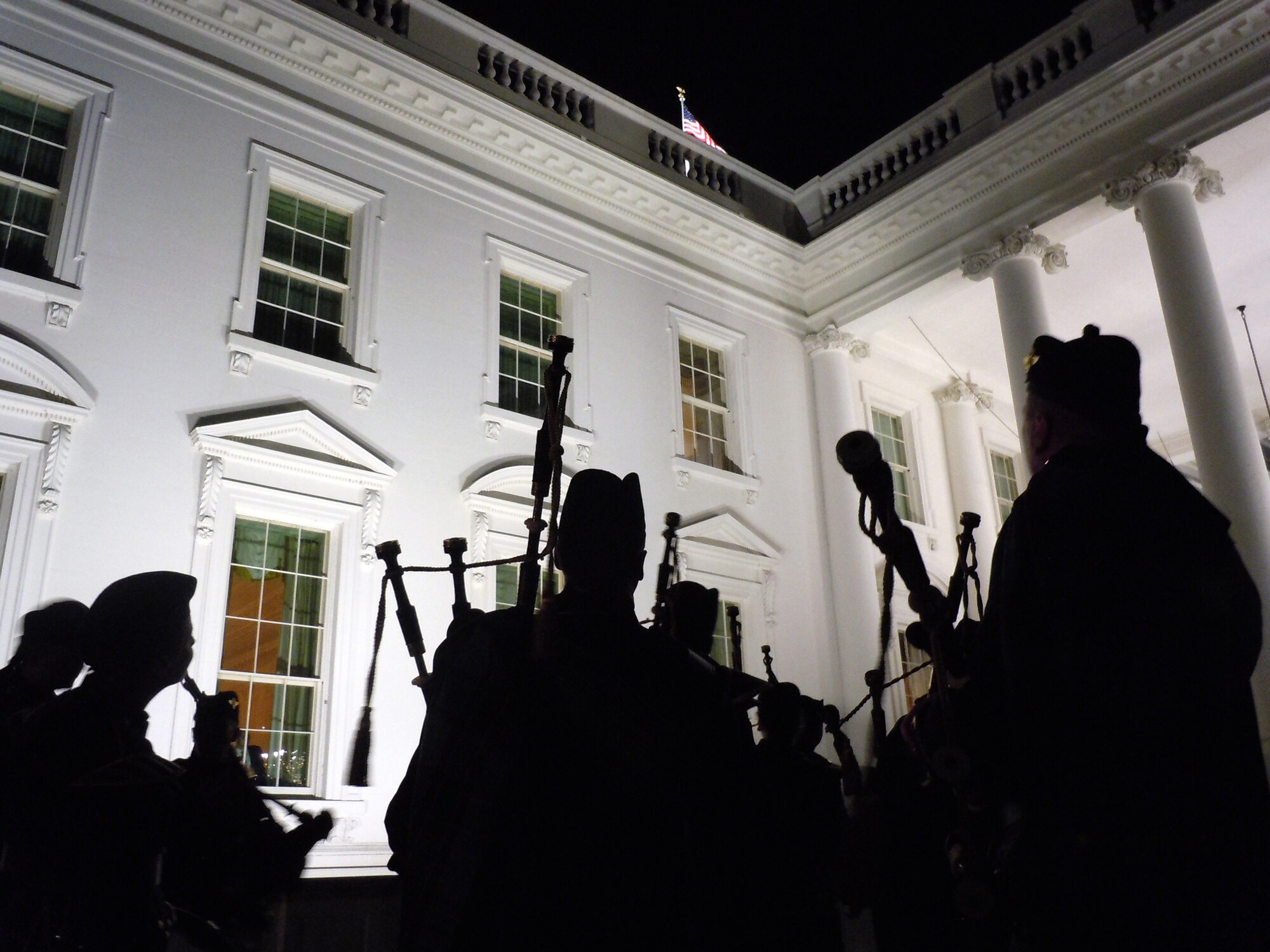 The Band of the Air Force Reserve's pipe band gathers outside the White House March 20, 2012, in Washington, D.C. They performed four missions for President Barack Obama and Irish Prime Minister Enda Kenny. The pipers have performed this mission every year since 1995, Elements of the Reserve band perform an average of 279 missions annually in support of Regular Air Force and Air Force Reserve mission taskings. (U.S. Air Force photo by Chief Master Sgt. Mark Burditt)