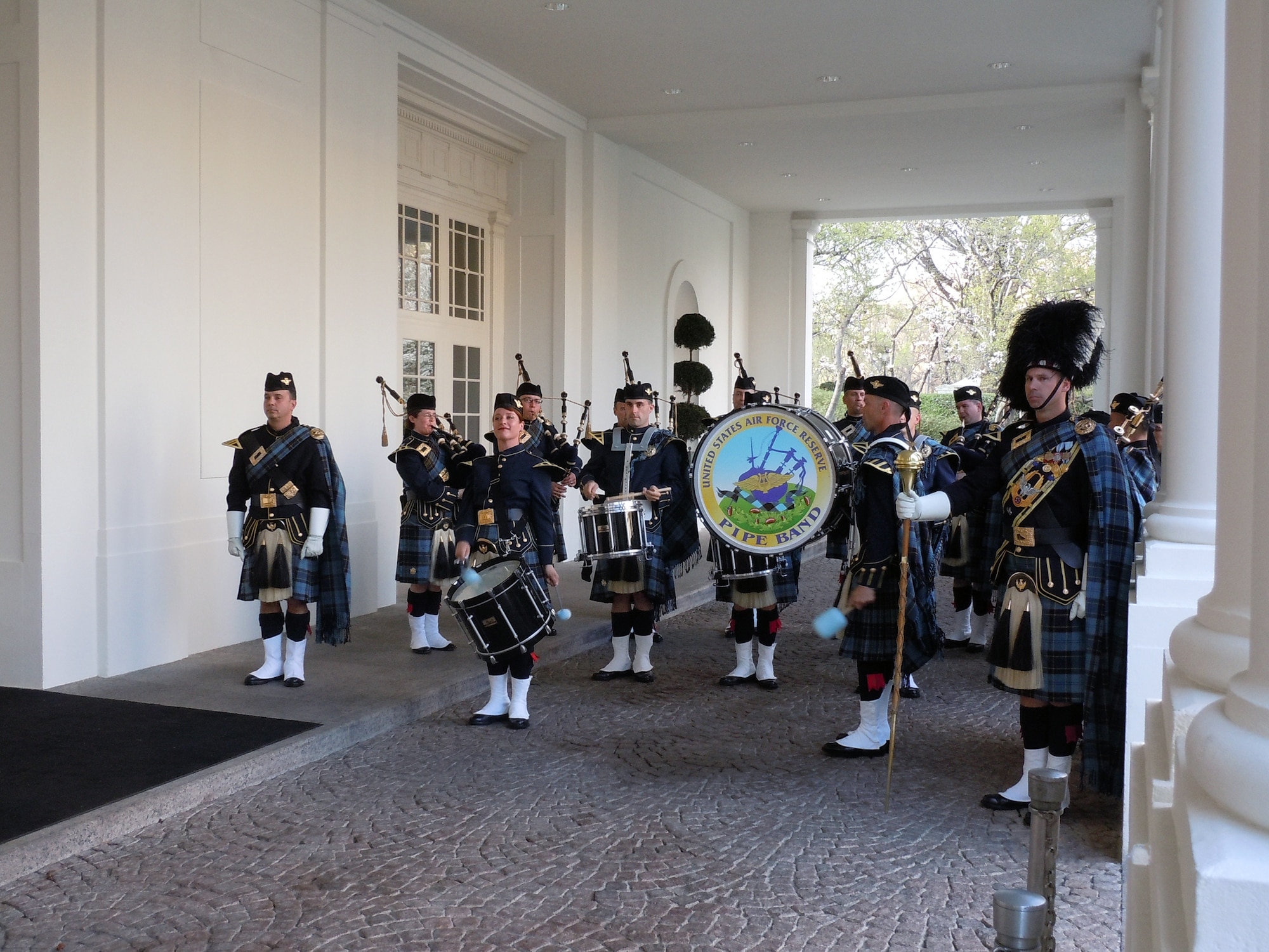 The Band of the Air Force Reserve's pipe band performs at the Carraige Entrance of the White House March 20, 2012, in Washington, D.C. They performed four missions for President Barack Obama and Irish Prime Minister Enda Kenny. The pipers have performed this mission every year since 1995, Elements of the Reserve band perform an average of 279 missions annually in support of Regular Air Force and Air Force Reserve mission taskings. (U.S. Air Force photo by Chief Master Sgt. Mark Burditt)