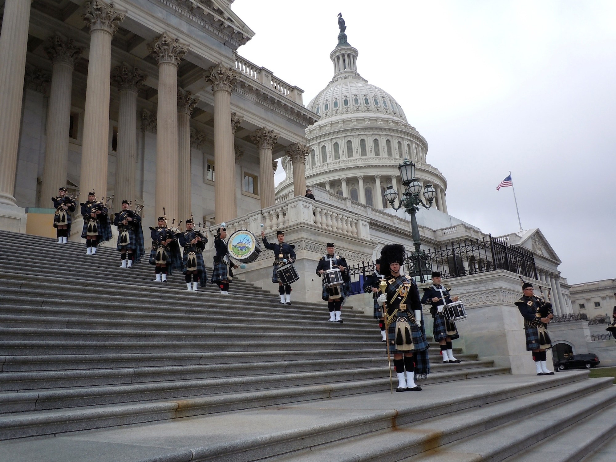 The Band of the Air Force Reserve's pipe band performs on the steps of the Capitol building March 20, 2012, in Washington, D.C. They performed four missions for President Barack Obama and Irish Prime Minister Enda Kenny. The pipers have performed this mission every year since 1995, Elements of the Reserve band perform an average of 279 missions annually in support of Regular Air Force and Air Force Reserve mission taskings. (U.S. Air Force photo by Chief Master Sgt. Mark Burditt)