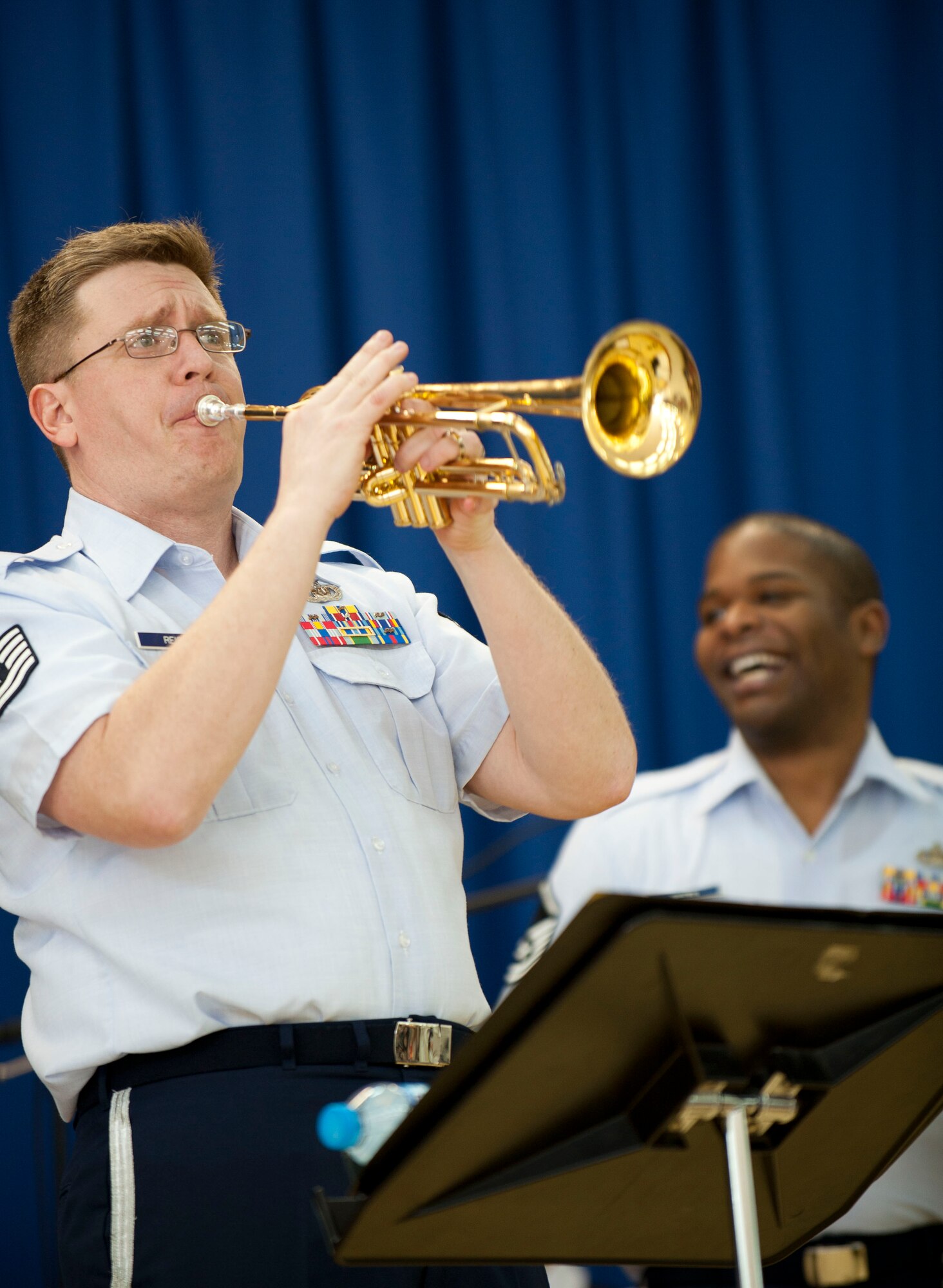 Tech. Sgt. Jeffrey Reich, trumpet player for U.S. Air Forces in Europe Band "Wings of Dixie," performs in the Incirlik Unit School multipurpose room March 22, 2012, at Incirlik Air Base, Turkey. Wings of Dixie performed several times for the school as part of the Music in Our Schools program and put on a show for members of Team Incirlik in the Club Complex ballroom March 23. (U.S. Air Force photo by Senior Airman Clayton Lenhardt/Released)