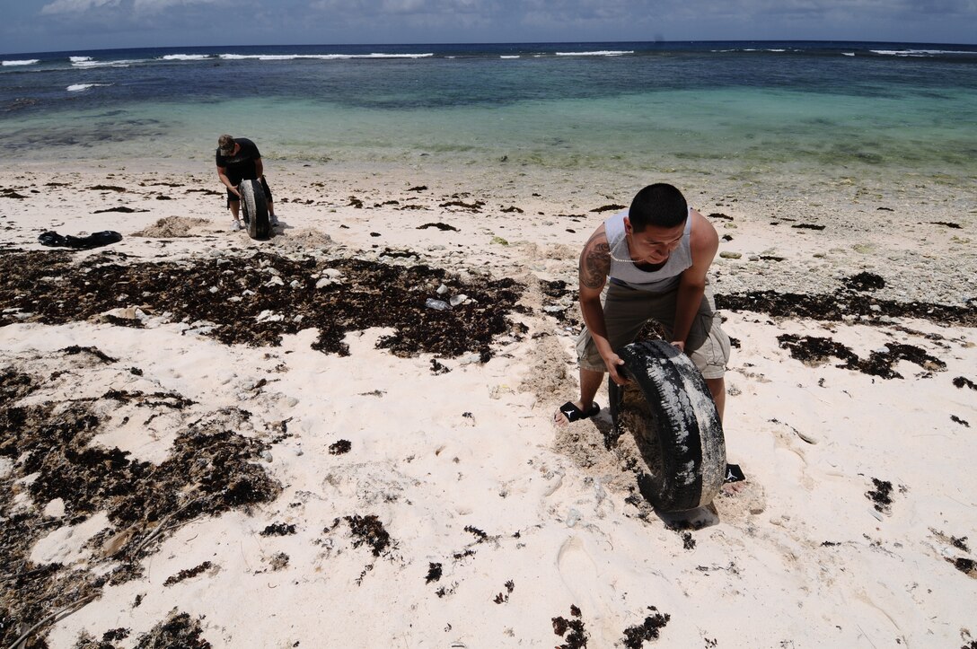 Airmen from the 36th Security Forces Squadron spend time cleaning Tangisen
Beach in the Dededo, Guam, March 22.  Assisting in such events allow Team
Andersen Airmen to get out and enjoy Guam while participating in the local
community.  (U.S. Air Force photo/Airman 1st Class Mariah Haddenham)
