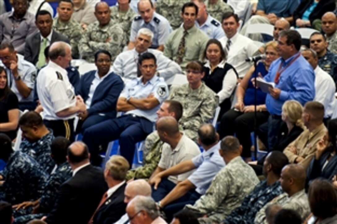 Army Gen Martin E. Dempsey, chairman of the Joint Chiefs of Staff, responds to a question at the all-hands call in Miami, March 26, 2012. The meeting allowed spouses, service members and veterans to ask Dempsey questions about benefits and the future of the military service.

