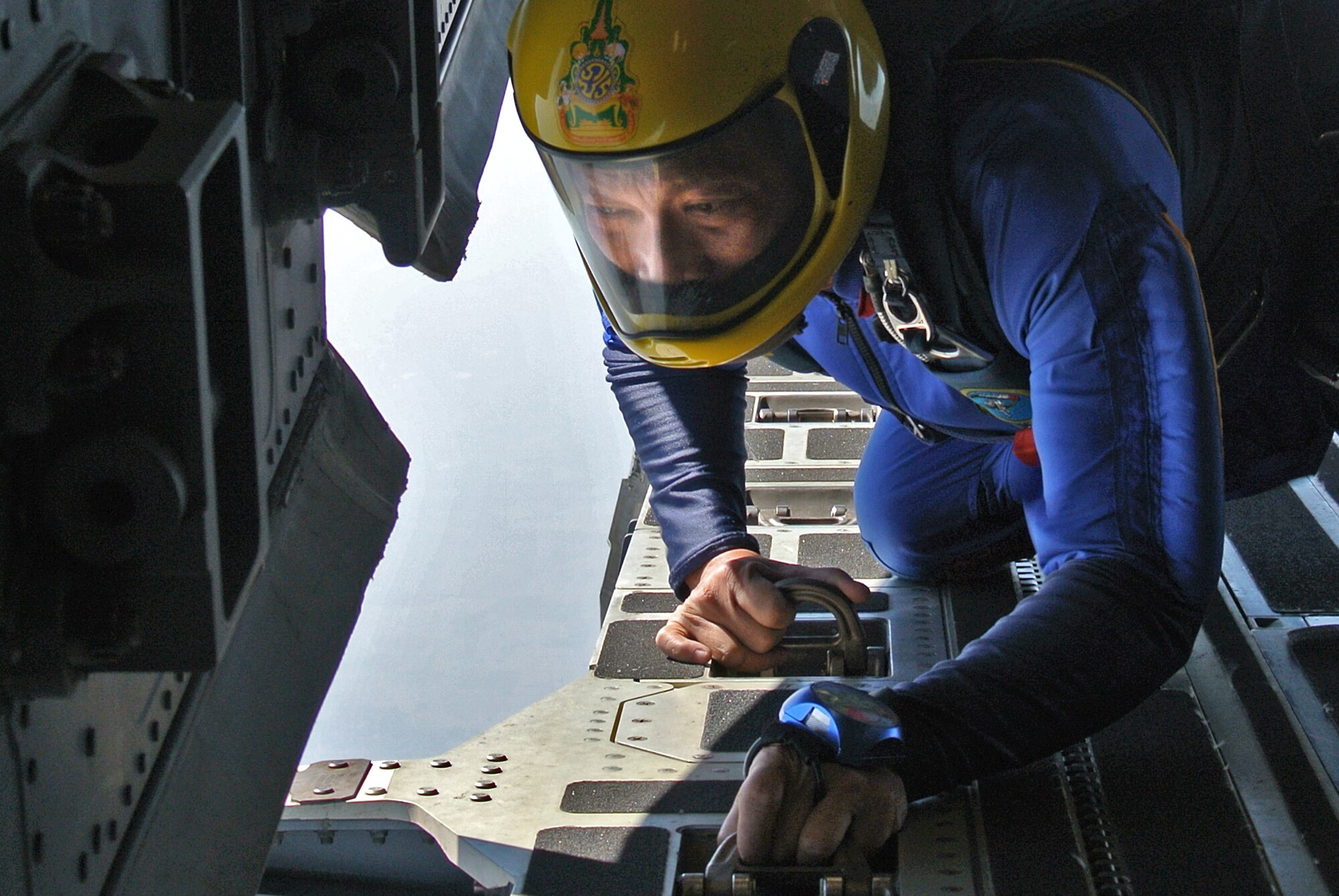 Royal Thai Air Force member prepares to jump from a C-17 Globemaster III, Mar. 22. The airmen and soldiers participated in the exercise’s largest bilateral freedom jump to close out Cope Tiger, a two-week long multi-lateral, large force air employment exercise between the U.S. Air Force, Royal Thai Air Force and Republic of Singapore Air Force.  The exercise included a total of 92 aircraft and 34 air defense units, including U.S. platforms such as the C-130 Hercules, A-10 Thunderbolt II, C-17 Globemaster III, and F-15 Eagle. (U.S. Air Force Photo/Capt David Herndon/released)