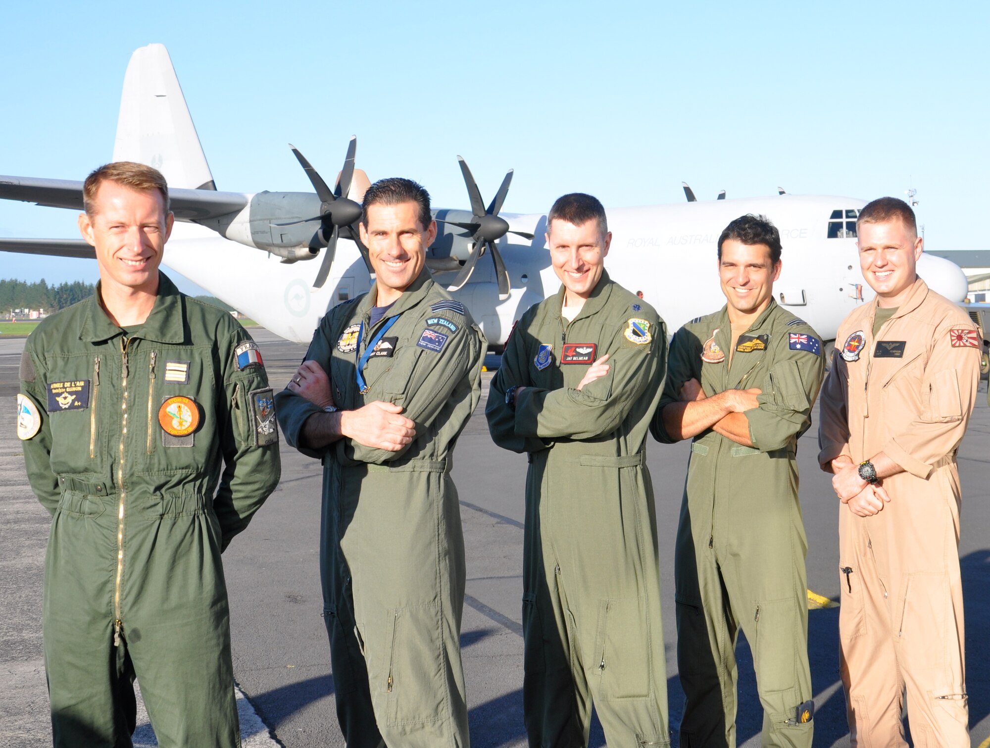 Detachment leaders from the New Caledonia, New Zealand, U.S. Air Force, Australian and U.S. Marine Corps pause for a photo during the KIWI FLAG media day Tuesday March 27, 2012. Through exercises such as KIWI FLAG regional partners are able to develop and expand combined airlift capabilities enhancing military relationships. (Not pictured is the detachment leader from the Republic of Singapore Air Force). (U.S. Air Force photo by Capt. Rebecca Heyse/Released)