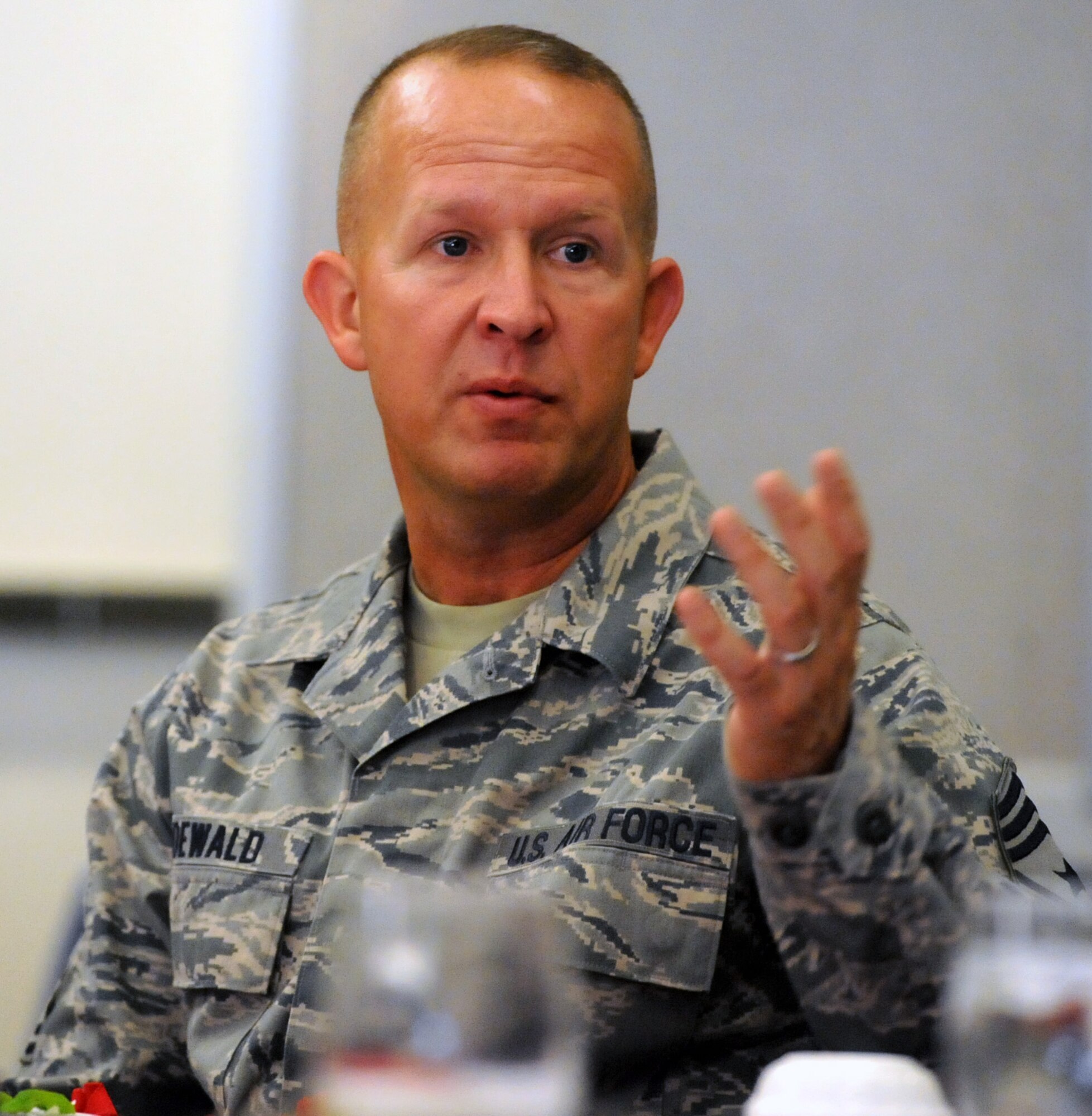 Chief Master Sgt. Robert Rodewald, 15th Wing command chief, speaks to attendees of the 2012 Air Force Assistance Fund kickoff breakfast March 22 at the Tradewinds enlisted club on Joint Base Pearl Harbor Hickam, Hawaii. Organizations supported by the Air Force Assistance Fund include the Air Force Aid Society, Air Force Villages, Inc., the General and Mrs. Curtis LeMay Foundation, and the Air Force Enlisted Villages, Inc. (U.S. Air Force photo by Staff Sgt. Nathan Allen)