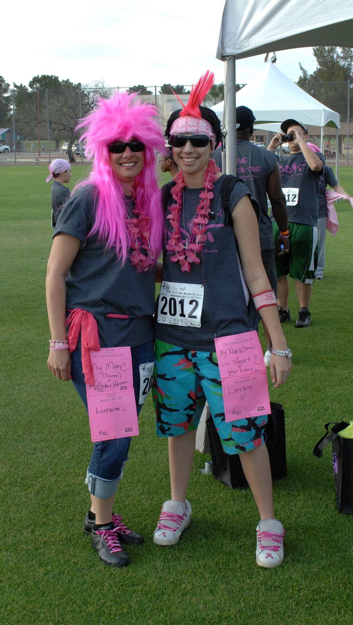 U.S. Air Force Master Sgt. Natalie Brockman, 355th Equipment Maintenance Squadron armament shop superintendent, stand with her daughter Jenna, for a picture at the Susan G. Komen Race for the Cure 5K at Reid Park March 25. The team from Davis-Monthan raised more than $12,800 for breast cancer research. (U.S. Air Force photo by Airman 1st Class Michael Washburn/Released)