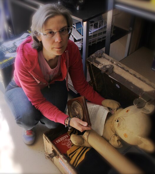 Dr. Circe Woessner with "Yogi," one of "Operation Footlocker's" many treasures.