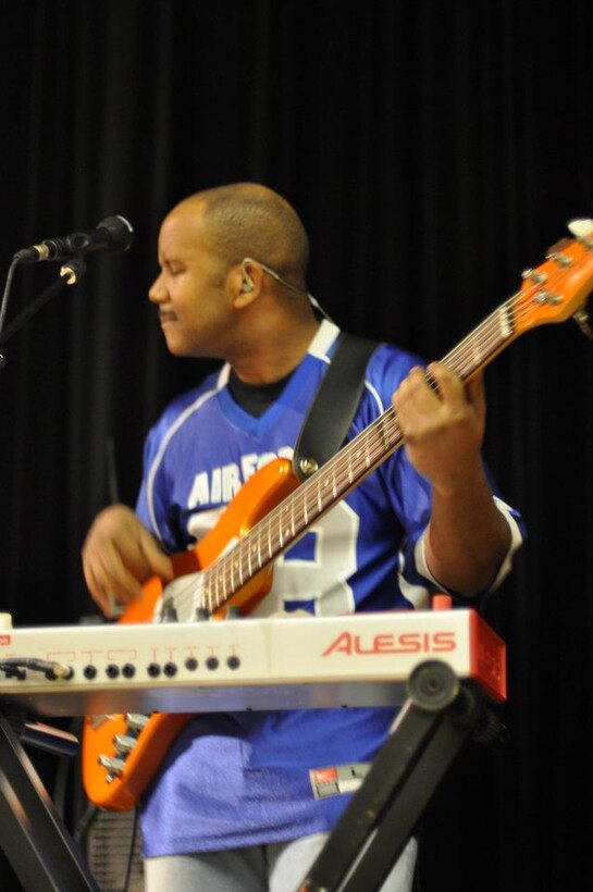 Bassist SrA Henry Robersion performs at the Fiesta Military-Civilian Reception.