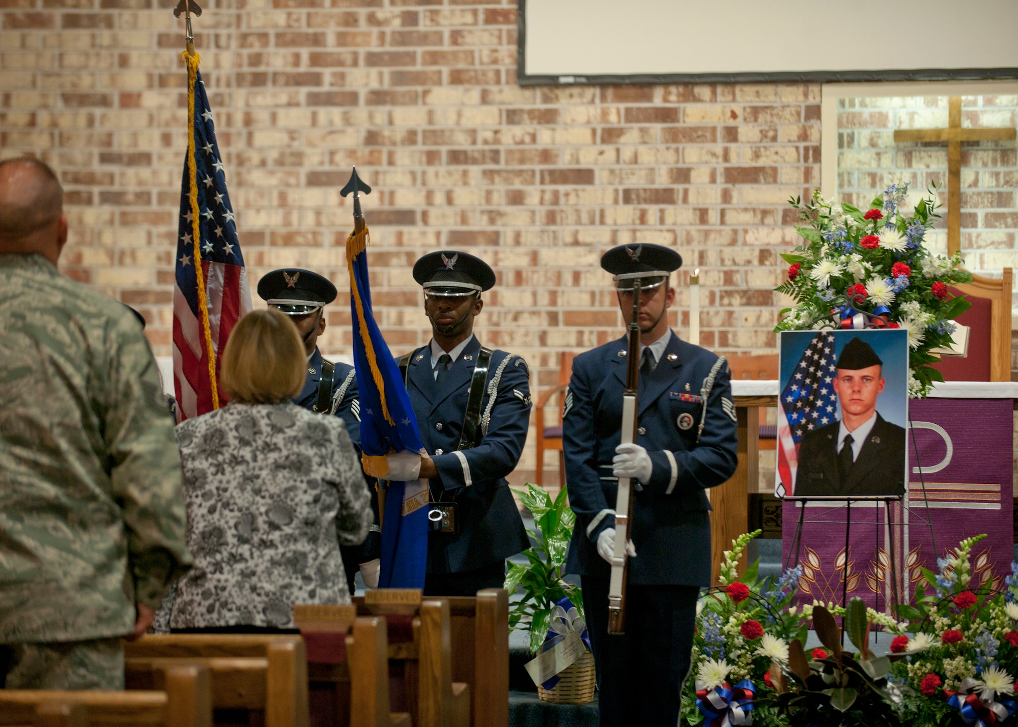 The Moody Air Force Base Honor Guard posts the colors for the national anthem during a memorial service for U.S. Air Force Airman 1st Class Stephen Bost, 23d Logistics Readiness Squadron, at the Base Chapel March 26, 2012, at Moody Air Force Base, Ga. Members of the 23d LRS and many others gathered to honor the life of Bost who passed away March 17. (U.S. Air Force photo by Senior Airman Eileen Meier/Released)