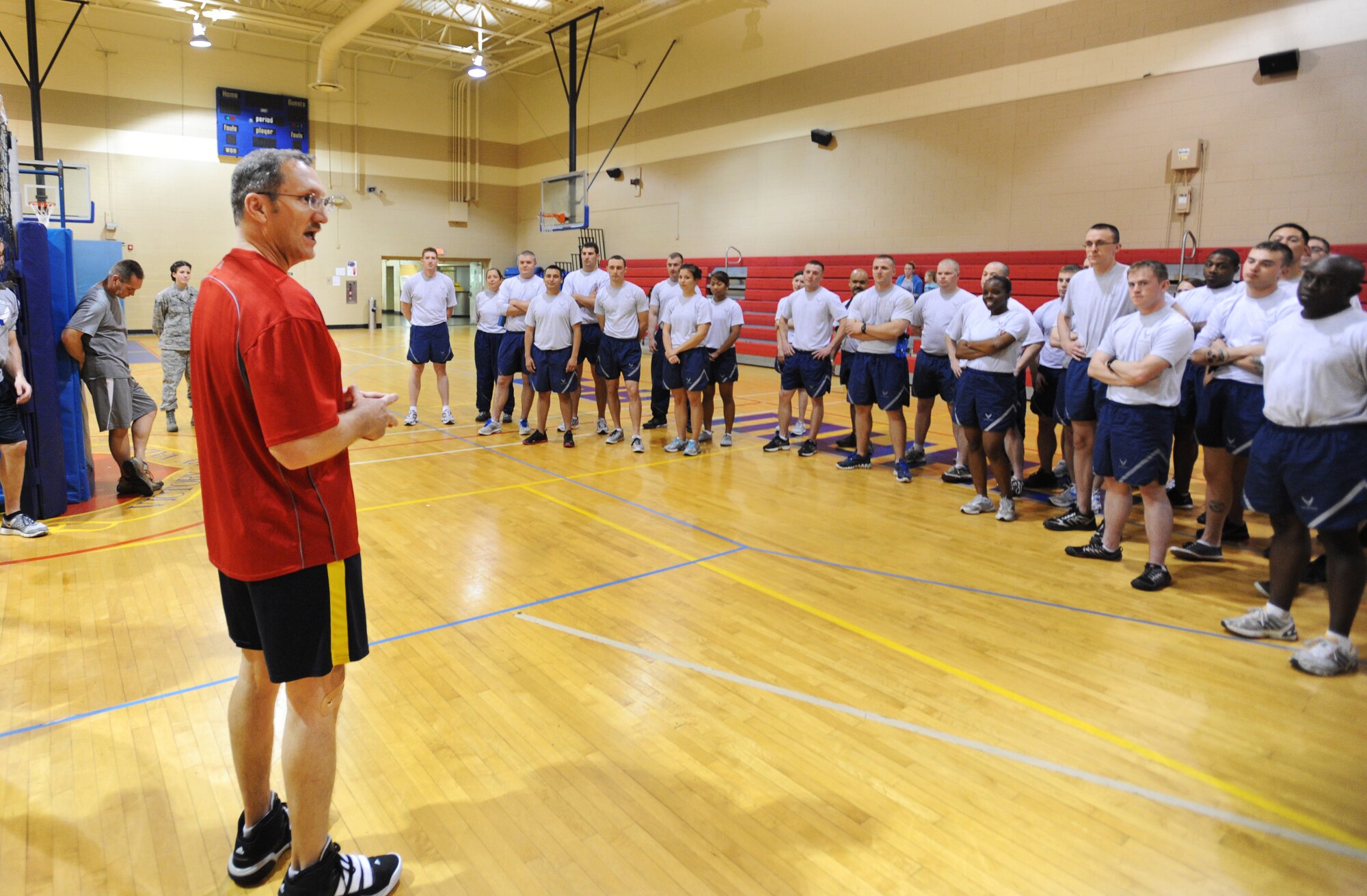 U.S. Air Force Chief Master Sgt. Brian Rogers, Air Force Central A6 chief enlisted manager, speaks to Airmen Leadership School Class 12-3, after defeating all three flights during a game of volleyball at the Fitness Center, Shaw Air Force Base, S.C., March 20, 2012. ALS is a five-week course designed to turn Airmen into supervisors that focuses on leadership and leadership duties. (U.S. Air Force photo by Senior Airman Tabatha McCarthy/released)