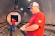 William Lowery and Johnny Moncrief, in background, 574th Sructural Repair Squadron, clear out the autoclave during the owl shift in Bldg. 169. Autoclaves are pressure vessels used to process parts and materials which require exposure to elevated pressure and temperature. (U. S. Air Force photo by Sue Sapp)