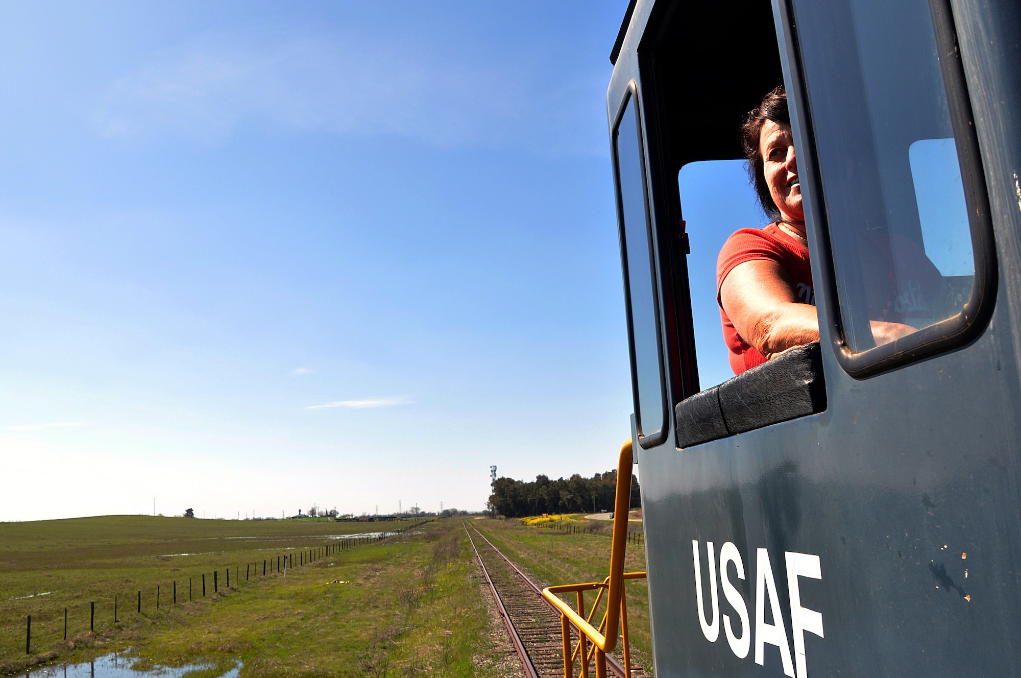 Susan Mertes, 9th Support Division locomotive engineer, operates a locomotive at Beale Air Force Base, Calif., March 21, 2012. Mertes has worked in many positions on base since 1979. (U.S. Air Force photo by Airman 1st Class Andrew Buchanan/Released)