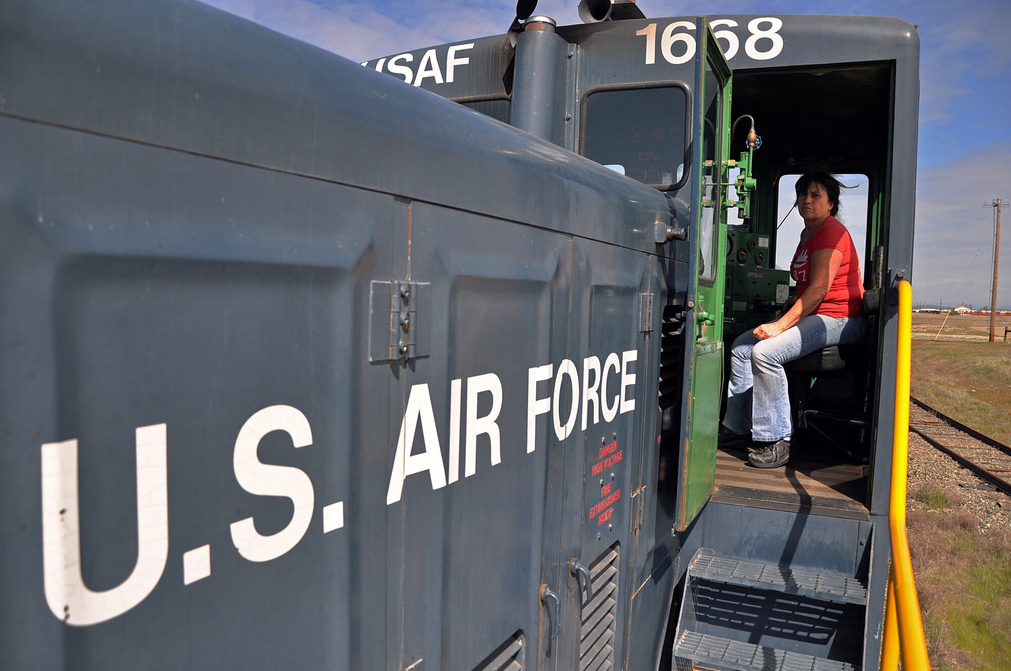 Susan Mertes, 9th Support Division locomotive engineer, operates a locomotive at Beale Air Force Base, Calif., March 21, 2012. Mertes operates one of the few locomotives in the Air Force inventory to deliver U-2 jet fuel to the base. (U.S. Air Force photo by Airman 1st Class Andrew Buchanan/Released)