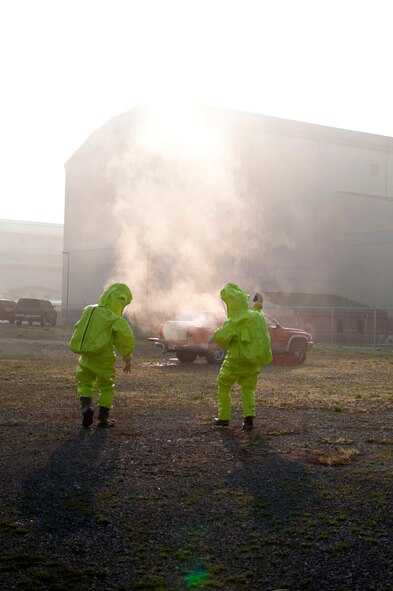 Fire Fighters from the 167th Airlift Wing, in Martinsburg, WV take part in a Hazardous Materials scenario.  The HazMat Technician class was held at the Air National Guard Base from March 12 - March 23, 2012.  The course encompassed both classroom lectures and hands on practicals.  The course is a requirement for 7 level upgrade training. (U.S. Air Force photo by Tech Sgt Michael Dickson)