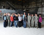 As part of an interactive tour of the 388th Fighter Wing, eight honorary commanders and their guests paid a visit to the phase dock at Hill Air Force Base, Utah, to see an F-16 engine in repair March 23. U.S. Air Force Col. Rick LeBlanc, the 388th FW vice commander, and Chief Master Sgt. Mark Batzer, command chief, hosted the tour of the wing and its operations and maintenance groups. (U.S. Air Force photo by Alex Lloyd/Released)