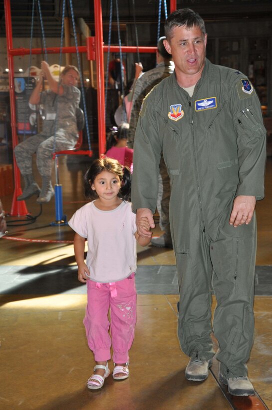 SANTIAGO, Chile – Col. Stephen Pedrotty, Air Forces Southern air boss for the FIDAE air show, takes time out of his schedule to spend a couple of hours with a Chilean orphan in Santiago, Chile, March 27. U.S. Air Force Airmen are visiting local hospitals and orphanages while simultaneously participating in the FIDAE air show. The U.S. Air Force’s participation in FIDAE illustrates the U.S. commitment to working with regional partners in ways that strengthen friendships, bolster partner nation capacities and expand cooperation between Airmen, which enhances regional security. (U.S. Air Force photo/Master Sgt. Kelly Ogden)