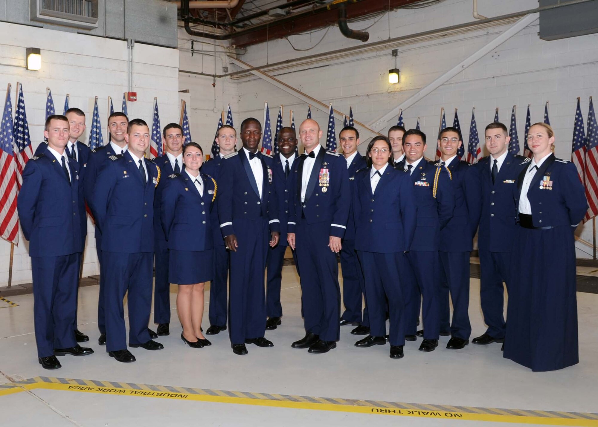 ALTUS AIR FORCE BASE, Okla. -- Gen. Edward A. Rice, Air Education and Training Command commander, Col. Anthony B. Krawietz, 97th Air Mobility Wing commander, and Cadets from the University of Oklahoma Air Force Reserve Officer Training Corps Detachment 675, pose for a group photo at the Air Force Ball, Sept. 17, 2011. The Air Force Ball is held every two years to celebrate the U.S. Air Force’s Anniversary. (U.S. Air Force photo by Senior Airman Leandra D. Stepp / 97th Air Mobility Wing Public Affairs-Released) 