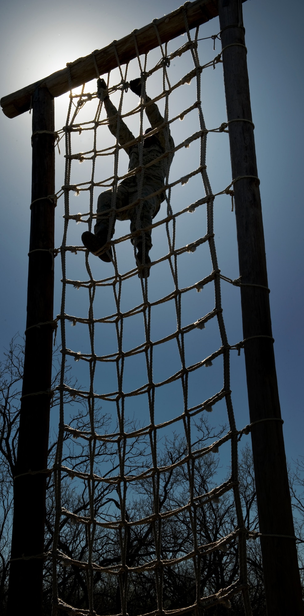 U.S. Air Force Airman 1st Class Terrance Branch, 7th Aircraft Maintenance Squadron, participates in one of 32 obstacle courses March 24, 2012, at the Warren Dodson training complex in Abilene, Texas. The course was hosted by the Airman Advisory Council to boost morale while supporting physical fitness. (U.S. Air Force photo by Airman 1st Class Jonathan Stefanko/ Released)