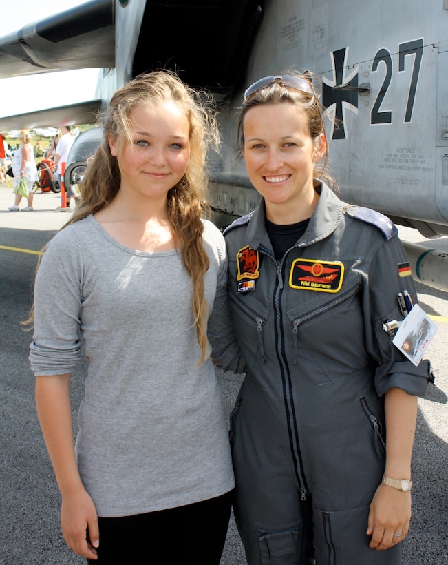 1Lt. Nicola Baumann, an instructor pilot with the 459th Flying Training Squadron, poses for a picture during an air show in Germany in this undated photo.  Baumann became just the second female fighter pilot in the history of the German Air Force back in 2007 after completing the Euro-Nato Joint Jet Pilot Training program at Sheppard Air Force Base, Texas.  (U.S, Air Force photo/Dan Hawkins)