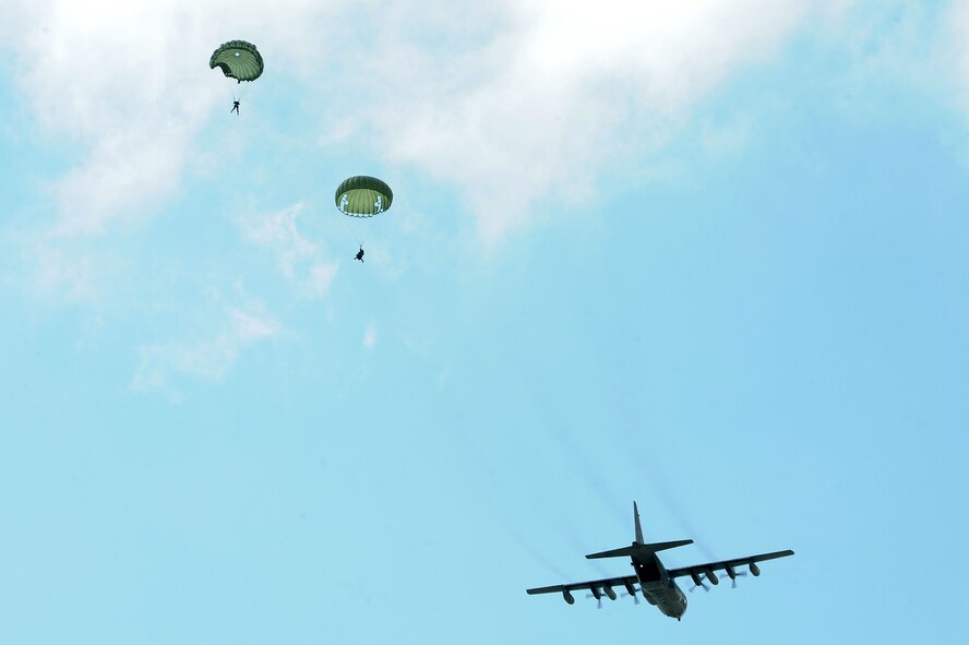 U.S. Air Force Airmen from the 820th Base Defense Group descend to a drop zone at Moody Air Force Base, Ga., March 21, 2012. Members on jump status are required to keep current on their training to remain jump qualified. (U.S. Air Force photo by Staff Sgt. Ciara Wymbs/Released)   