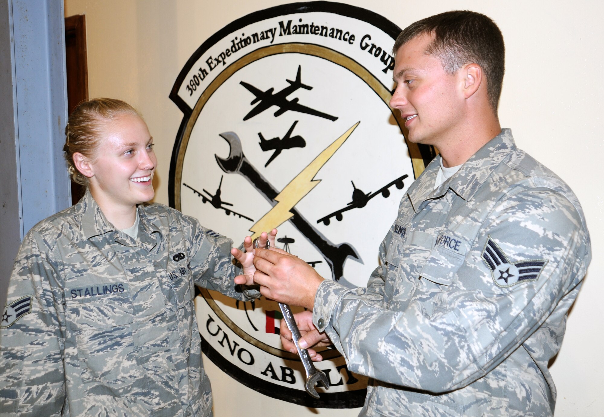 SOUTHWEST ASIA - Senior Airmen Josie and Michael Stallings pose for a photo Mar. 23, 2012. The two are both aerospace ground equipment technicians deployed from Ramstein Air Base, Germany. They?re deployed to the 380 Air Expeditionary Wing and celebrate their first wedding anniversary next month. (U.S. Air Force photo/Staff Sgt. J.G. Buzanowski)