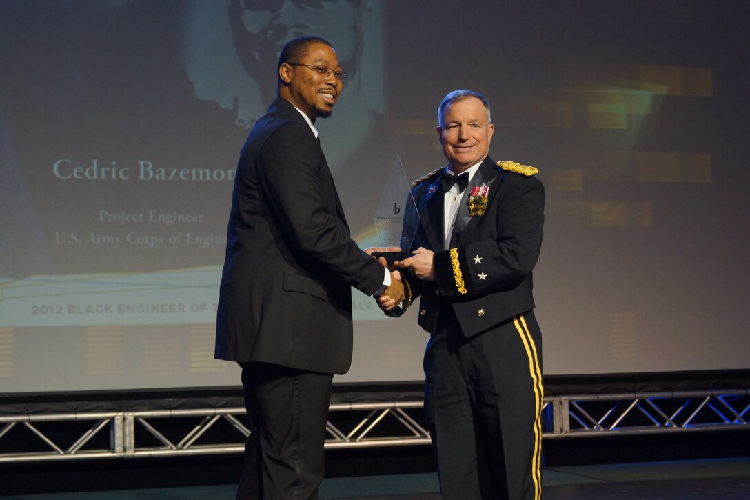 Cedric V. Bazemore is congratulated by Major General Merdith W. B. (Bo) Temple, USACE Chief of Engineers at the 26th BEYA STEM conference Black Engineer of the Year Awards Gala in Philadelphia.