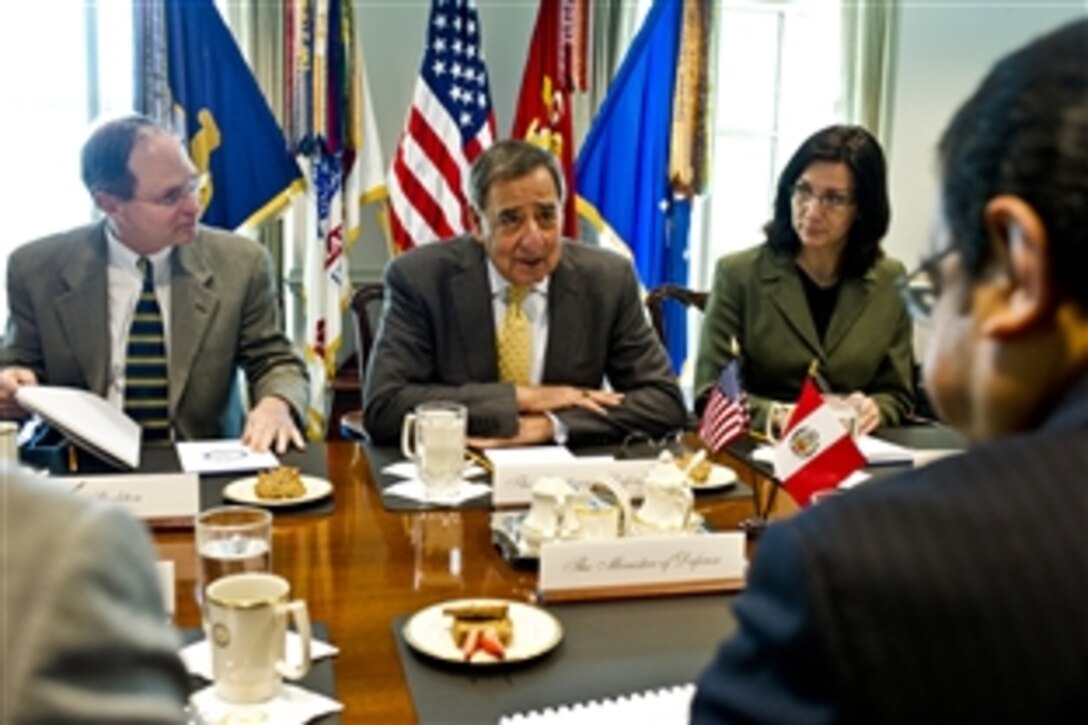 U.S. Defense Secretary Leon E. Panetta speaks with Peruvian Defense Minister Luis Alberto Otarola Penaranda during a meeting at the Pentagon, March 28, 2012. The two defense leaders discussed bilateral interests.