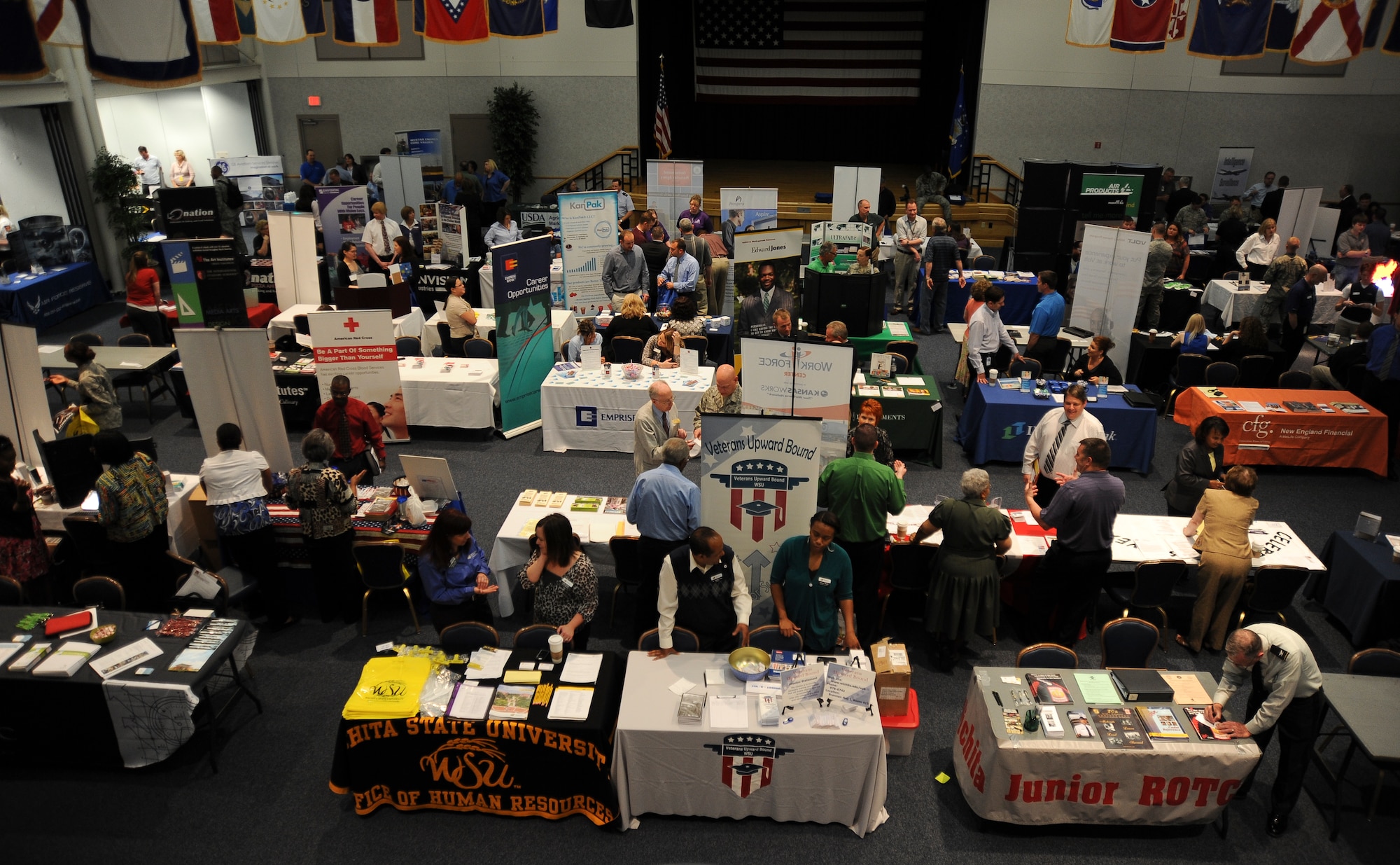 More than 80 employers accept resumes and distribute information at a job fair in the Robert J. Dole Community Center March 28, 2012, McConnell Air Force Base, Kan. More than 300 people attended the job fair, an annual event held by the Airman and Family Readiness Center. (U.S. Air Force photo/ Airman 1st Class Jose L. Leon)