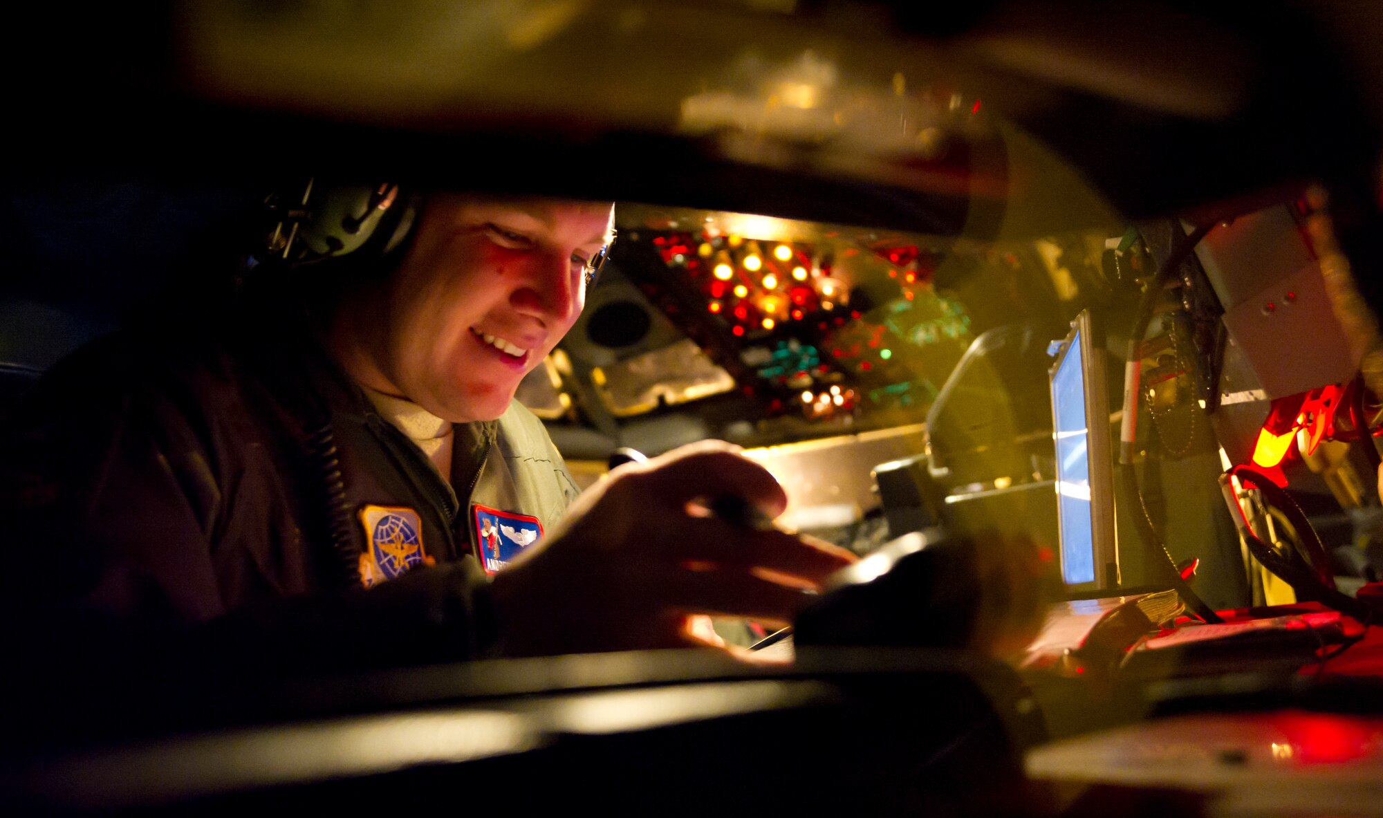 Capt. Andrew Nation, 349th Air Refueling Squadron navigator, plots a route prior to take off during a Special Operations Air Refueling exercise March 19, 2012, Northwester U.S. Airmen from the 22nd Air Refueling Wing showcased Special operations air refueling wich is the only KC-135 mission that requires a navigator. (U.S. Air Force photo/Airman 1st Class Armando A. Schwier-Morales)   