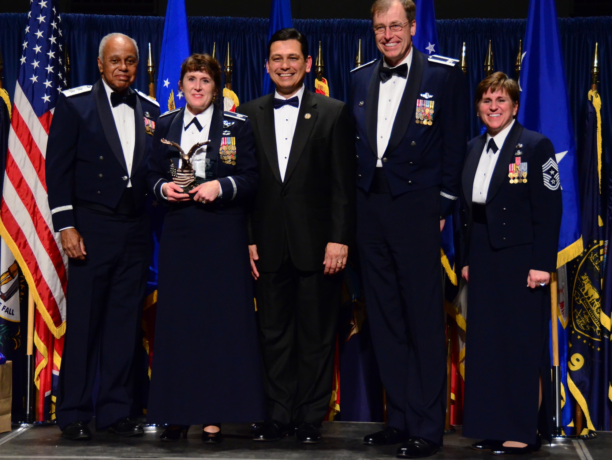 WRIGHT-PATTERSON AIR FORCE BASE, Ohio - Lt. Col. Kathy Staiger, 445th Airlift Wing. , accepts the 445th Airlift Wing Leadership Award duing the 445th AW Annual Awards Banquet March 3. (U.S. Air Force photo/Senior Airman Mikhail Berlin)