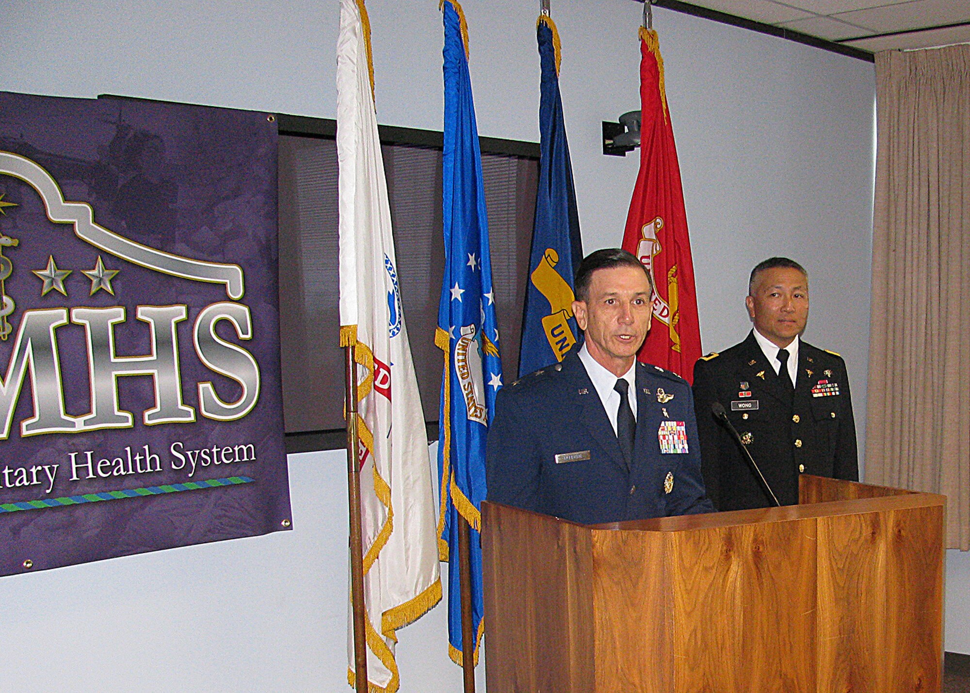 Air Force Maj. Gen. Byron Hepburn (left), 59th Medical Wing commander, and Army Maj. Gen. Ted Wong, Southern Regional Medical Command and Brooke Army Medical Center commander, announce the new San Antonio Military Health System Sept. 16, 2011, at a press conference in San Antonio, Texas. The new SAMHS will oversee all Army and Air Force medical treatment facilities in the San Antonio metropolitan area. Hepburn is the first director of the SAMHS and Wong is now the new deputy director of SAMHS. (US Air Force photo by Ron Rogers)